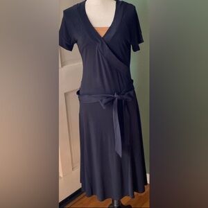 Women’s black dress by Versailles, size L